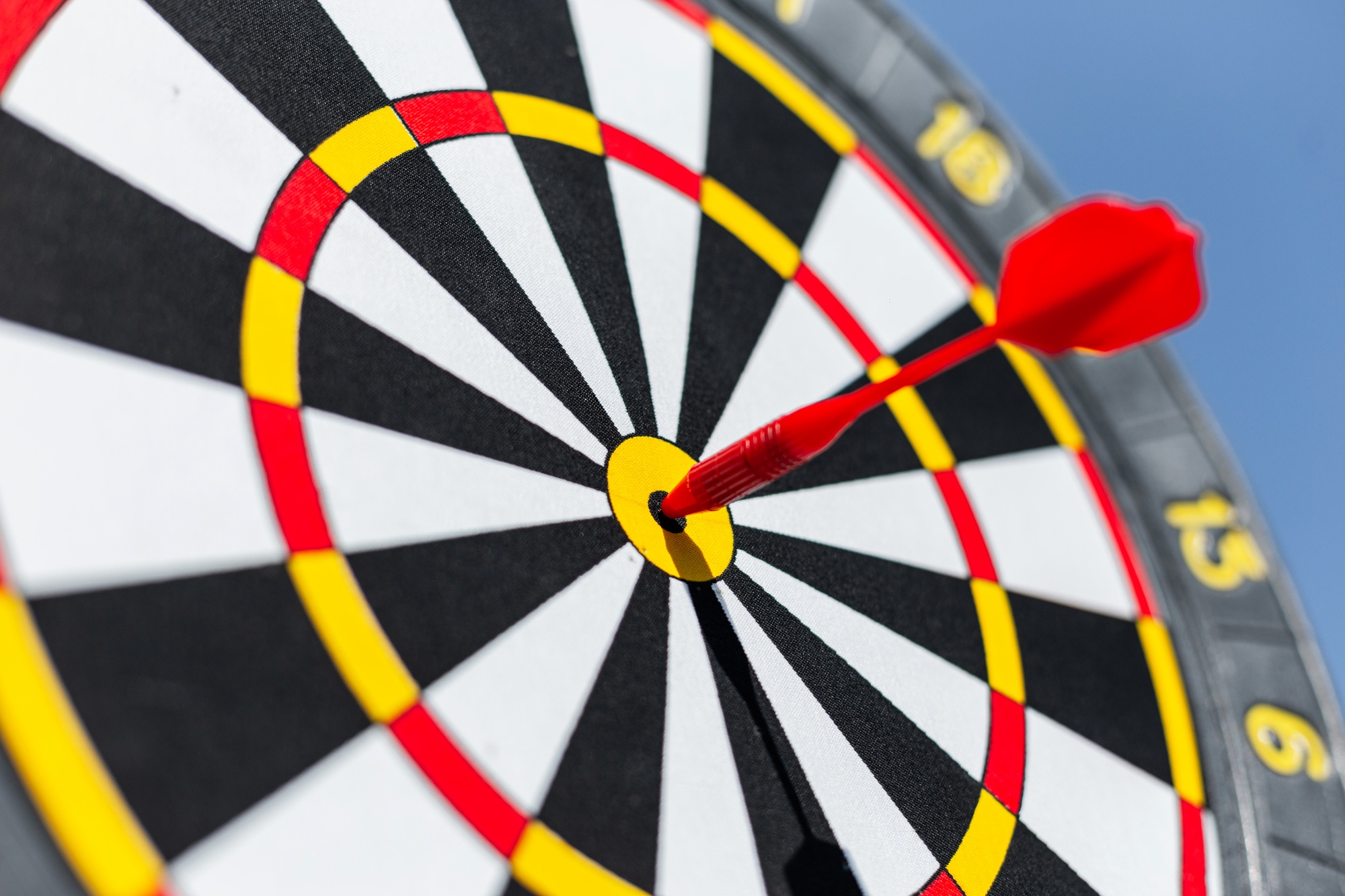 The red dart hit the center of the target. Marketing and successful advertising, concept