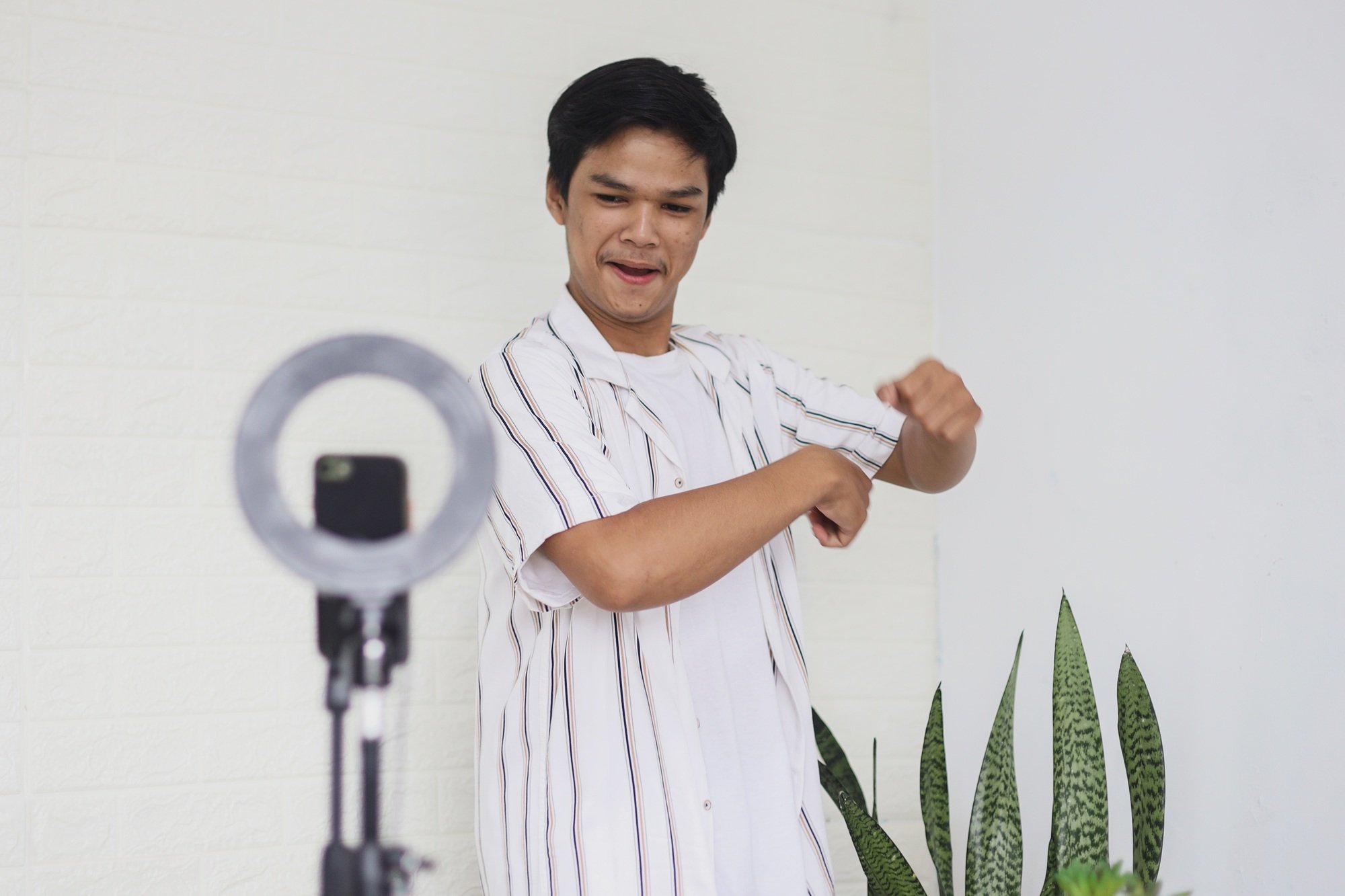 Young Asian man dancing tiktok