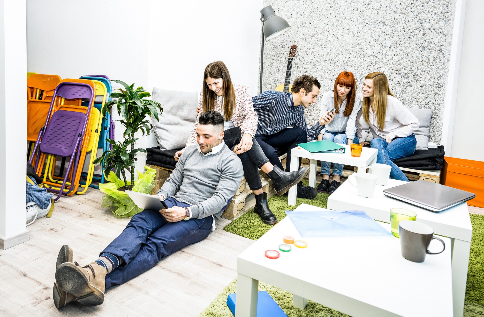 Young people employee workers having break in start up office