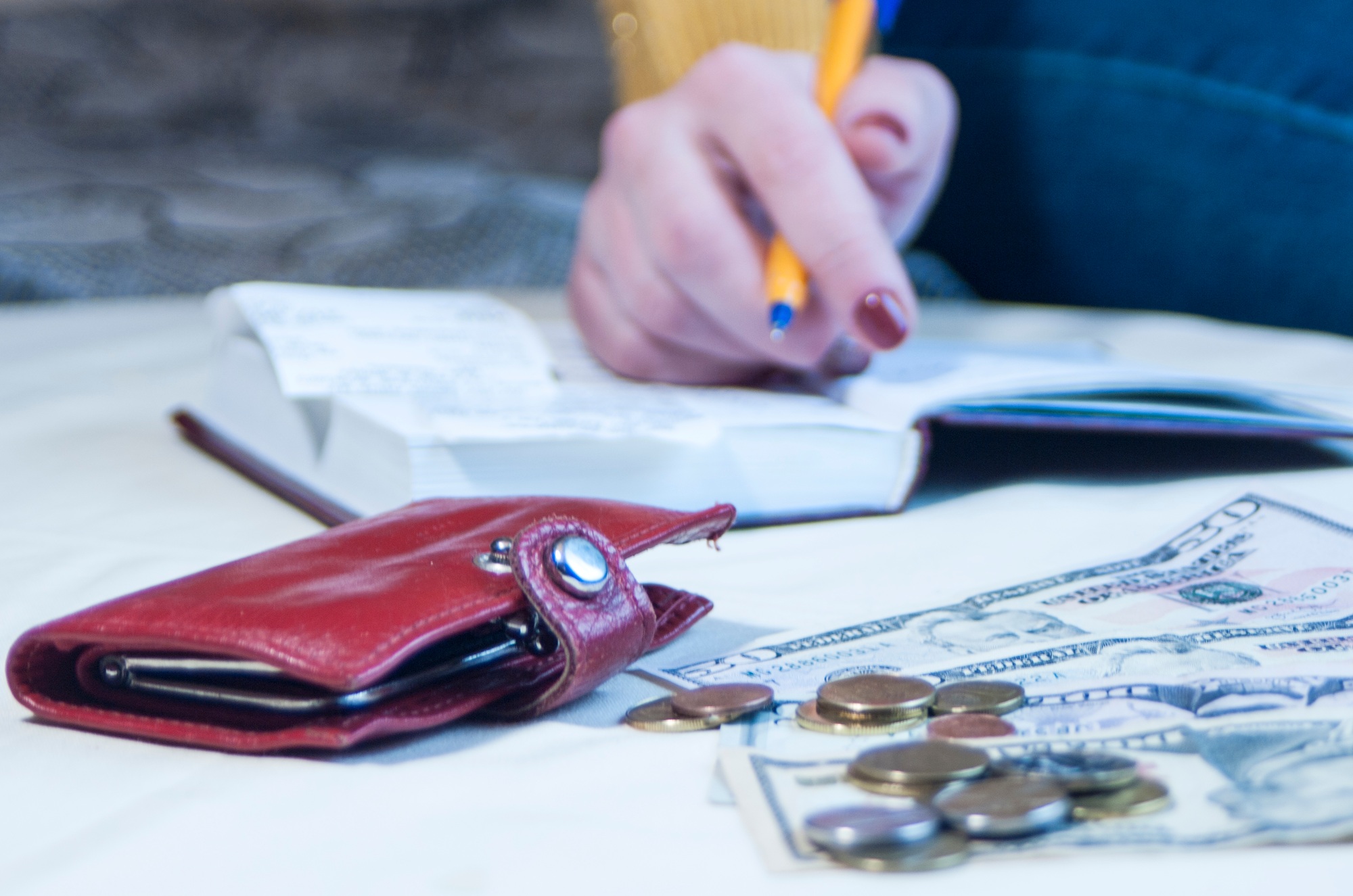 a business woman calculates the financial costs and revenues,