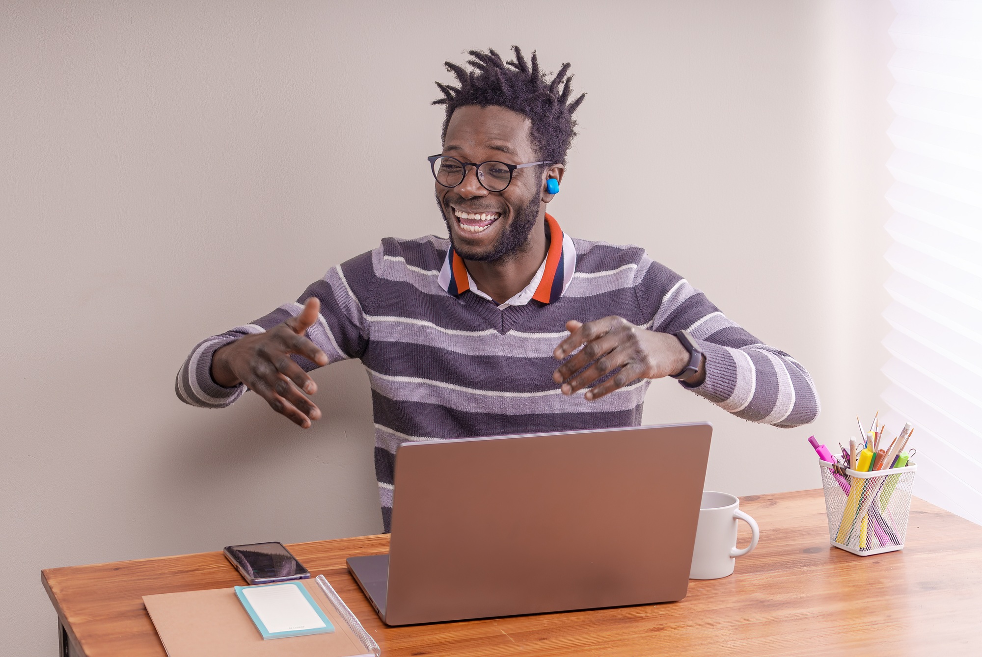Afroamerican Student in Video Call with Headphones