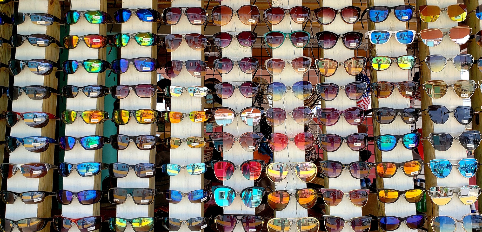 All in a row bright and colorful shades in outdoor retail display for retail sale fashion.