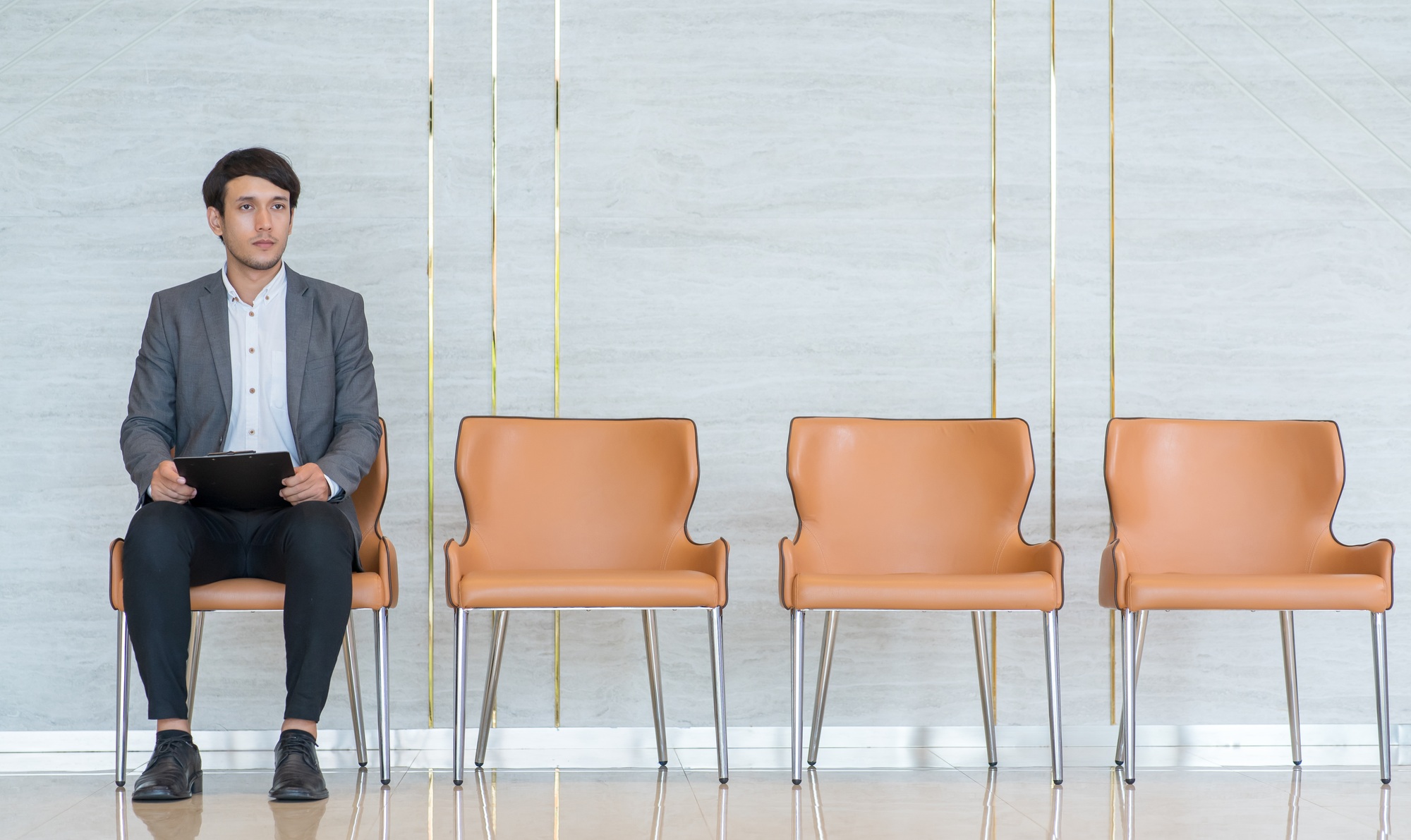 Asian business people are stressed about waiting for a job interview