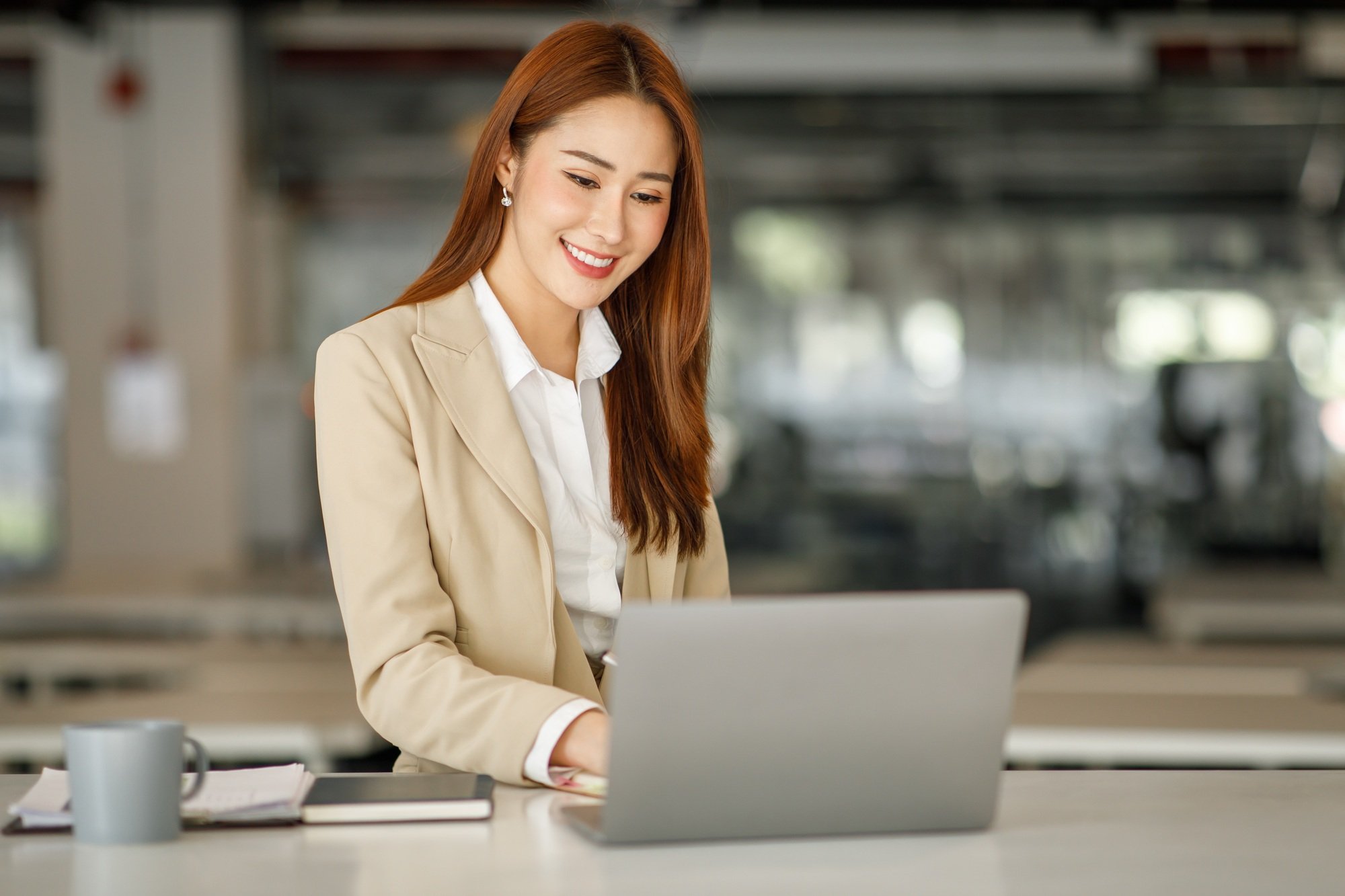 Asian business woman office,Professional Tax Accountant Using E Invoice Finance Software