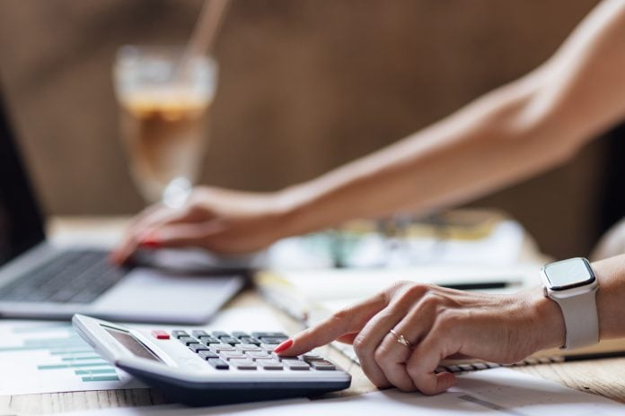 Auditor accountant or financial expert ceo manager looking marketing research report, analyzing
