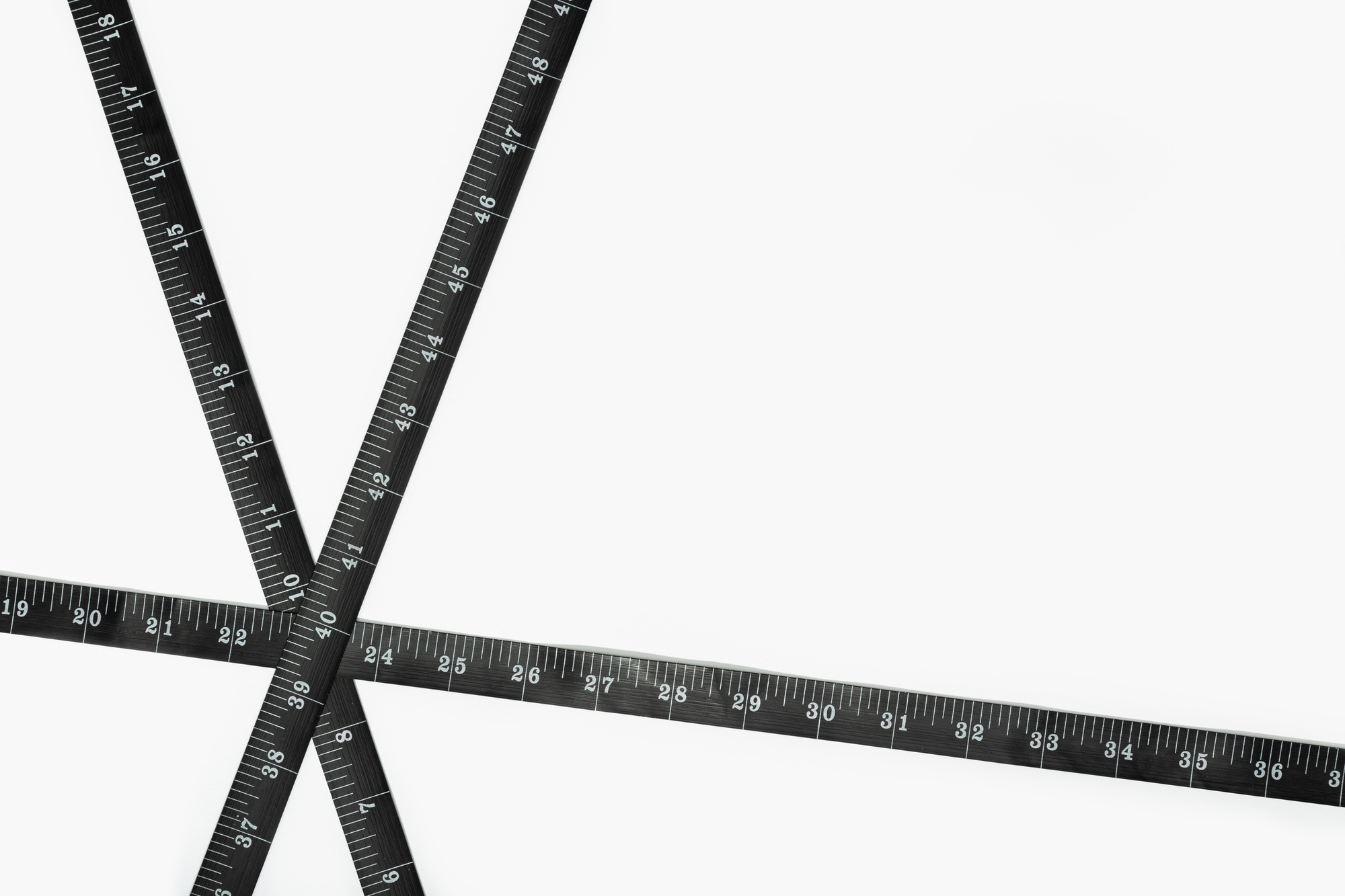 Black Measure tape on white background