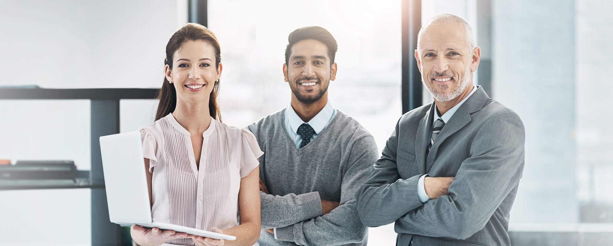 Business people, portrait and office with laptop, digital consultant and agency staff success. Happ