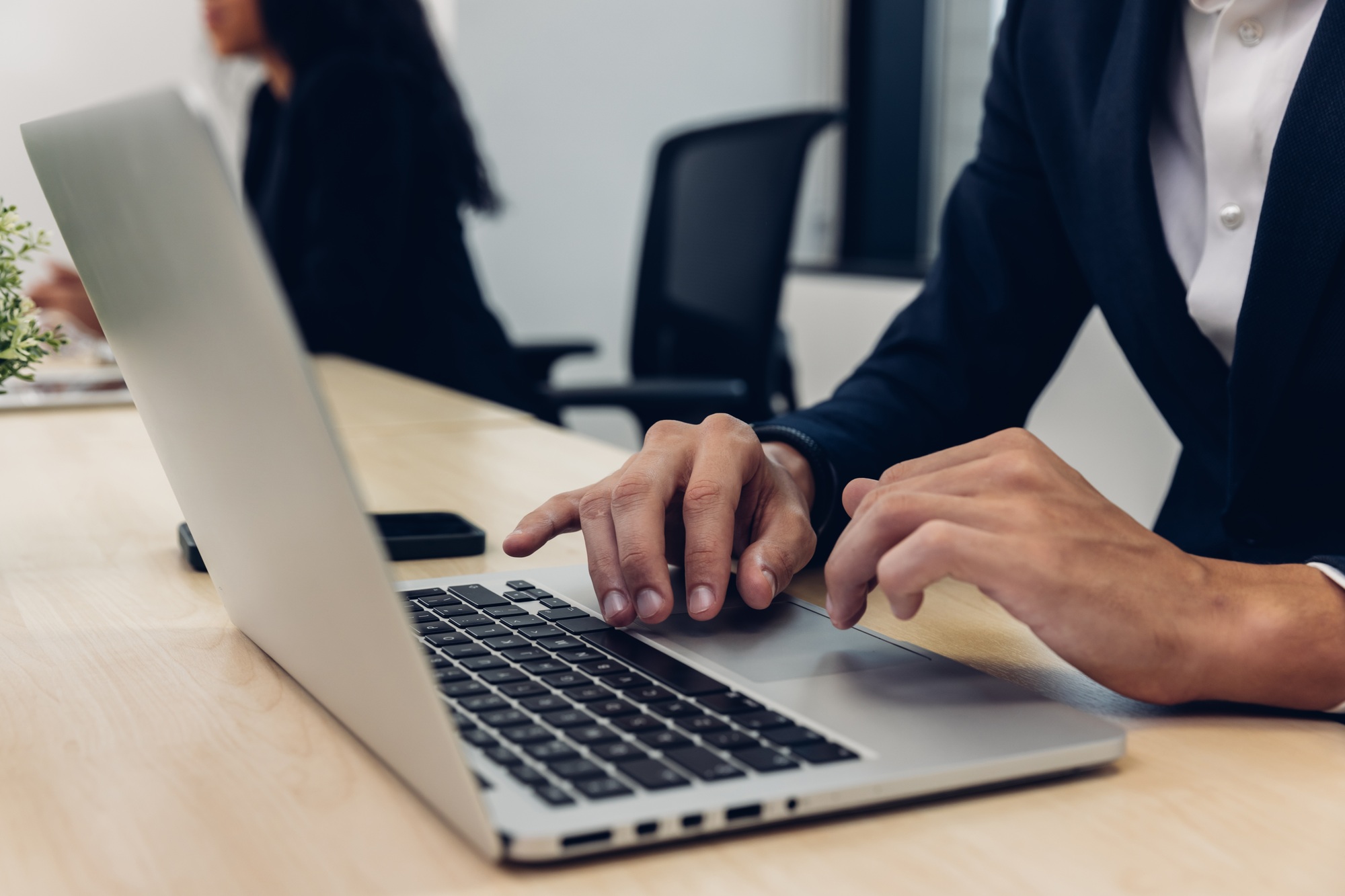 Business people using smart phone or computer for Chat GPT Chat with AI or Artificial Intelligence.