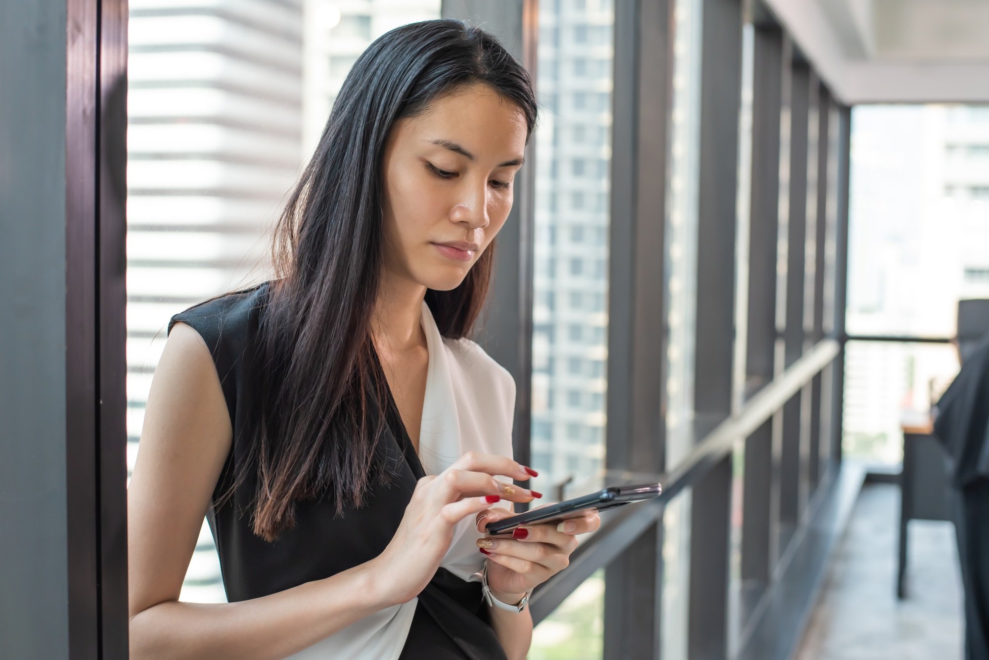 business woman use mobile phone for check email or chat