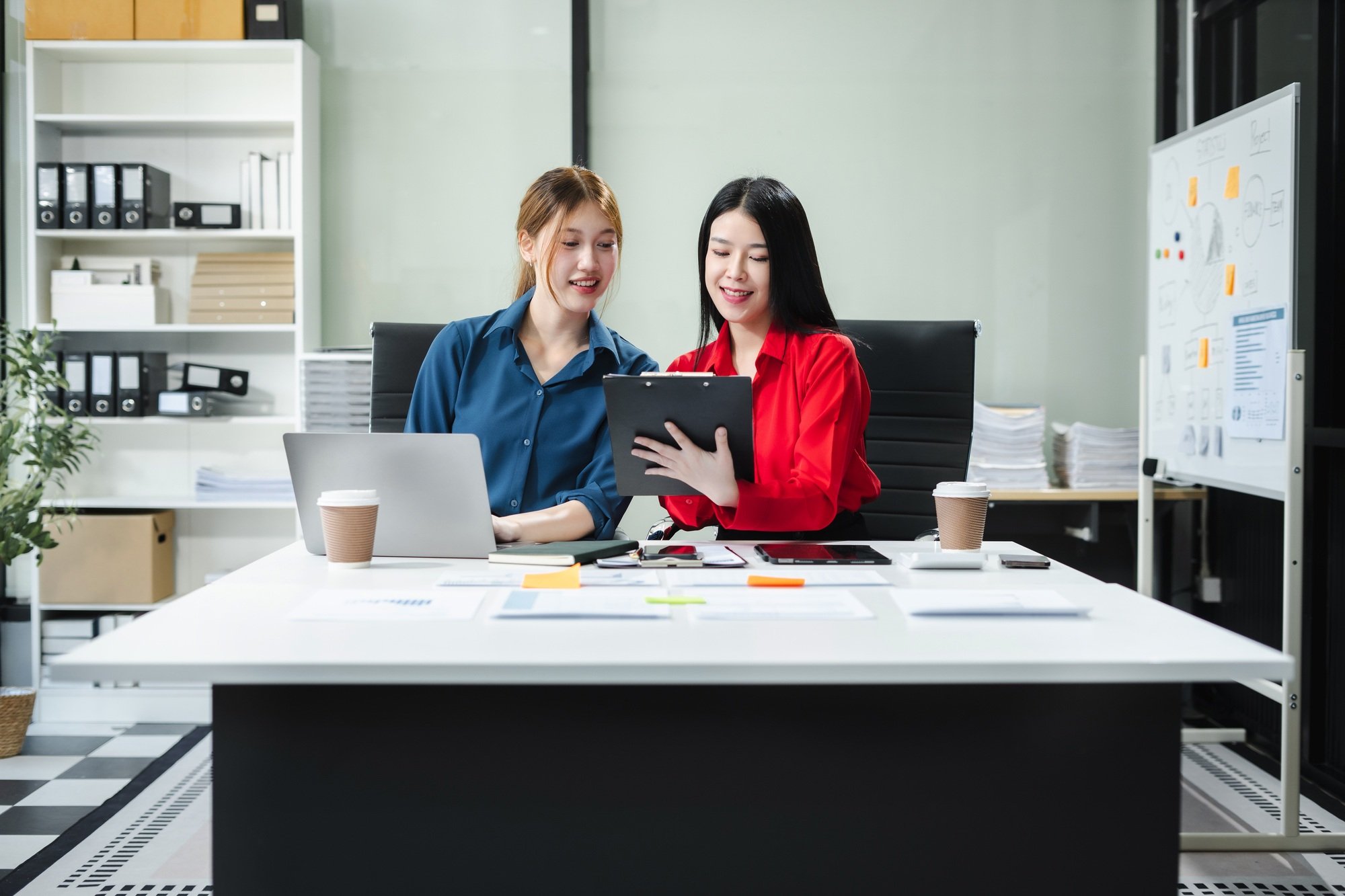 Businesswoman analyzing business enterprise data management, business analytics with charts