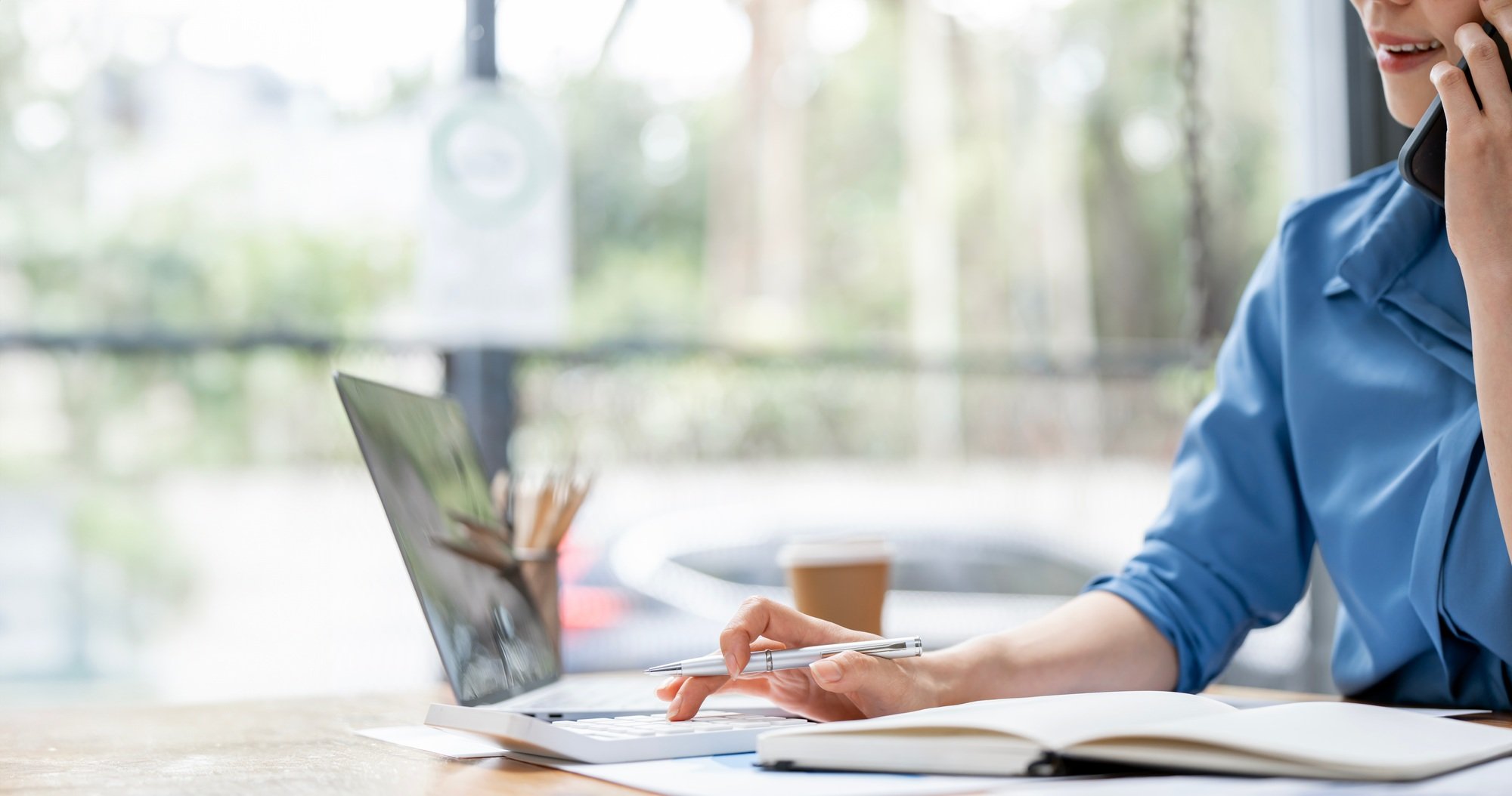Businesswoman working Financial on calculator, calculate business marketing on financial document.