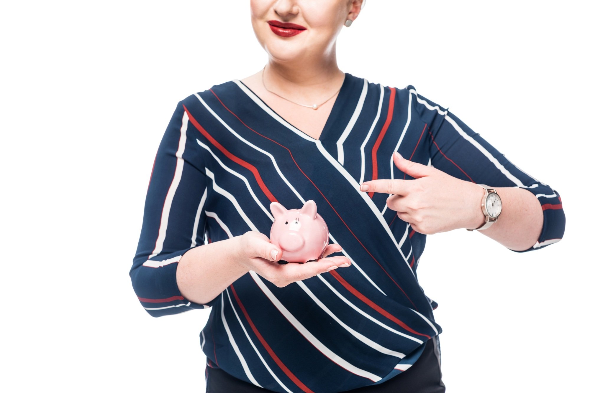 cropped image of businesswoman pointing at pink piggy bank isolated on white background