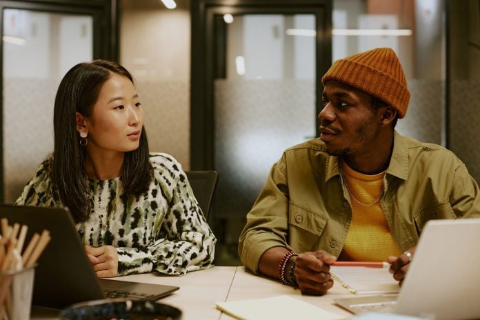 Designer and Manager Discussing Project