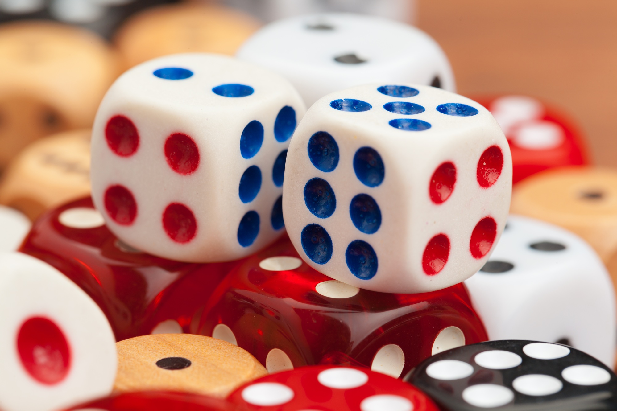 Dice on a wooden table. Concept for business risk
