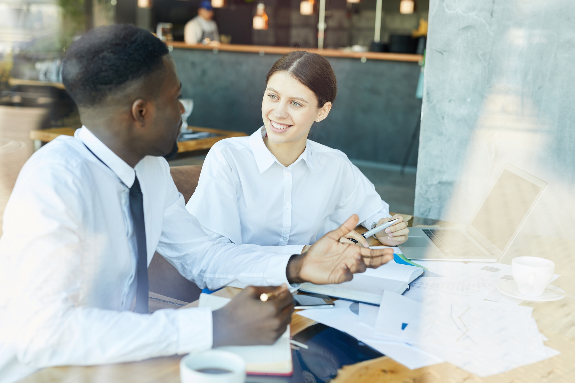 Discussing sales promotion ideas in restaurant