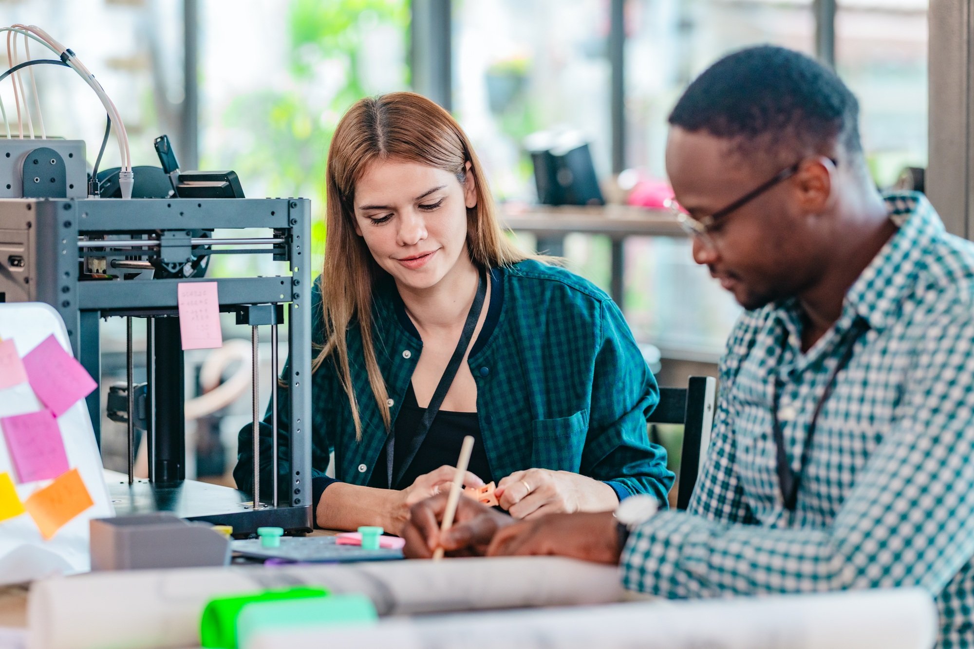 Diverse Startup Team Working on 3D Printing Project