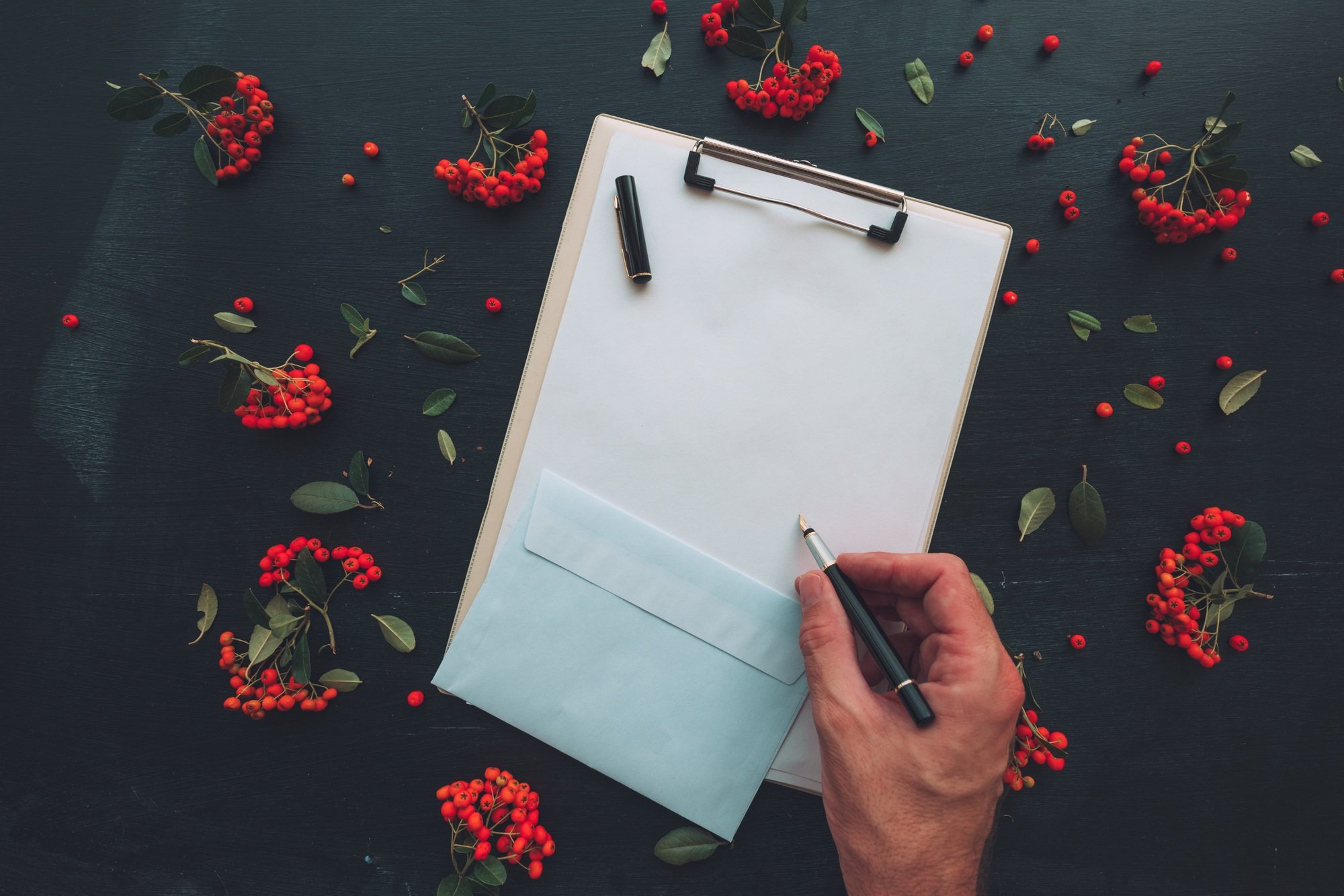 Flat lay hand writing letter