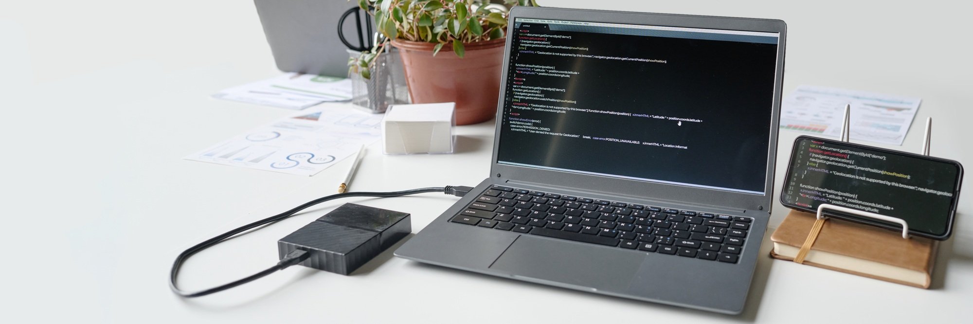 Header of Laptop and Smartphone with Codes