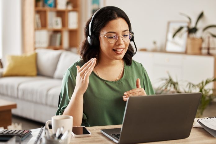 Home customer support, laptop video call and woman explain consultation, ecommerce or sales pitch i