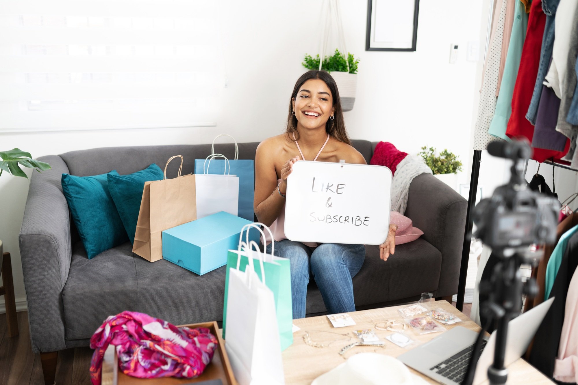 Influencer showing a call to action in video