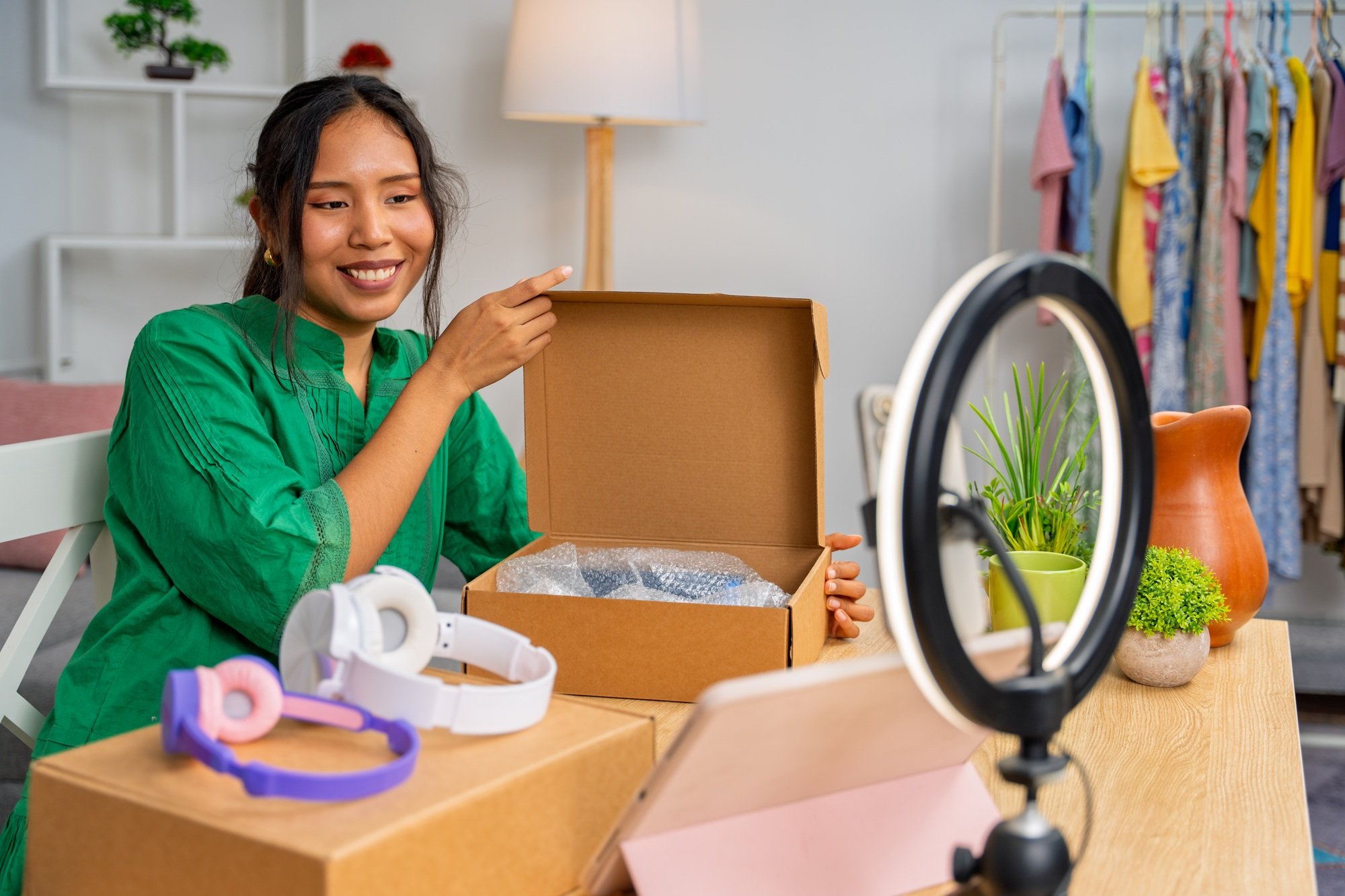 Influencer unboxing products and creating online content for social media
