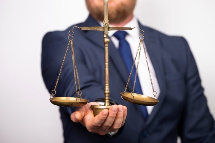 Man with scale. Legal law, advice and justice concept.