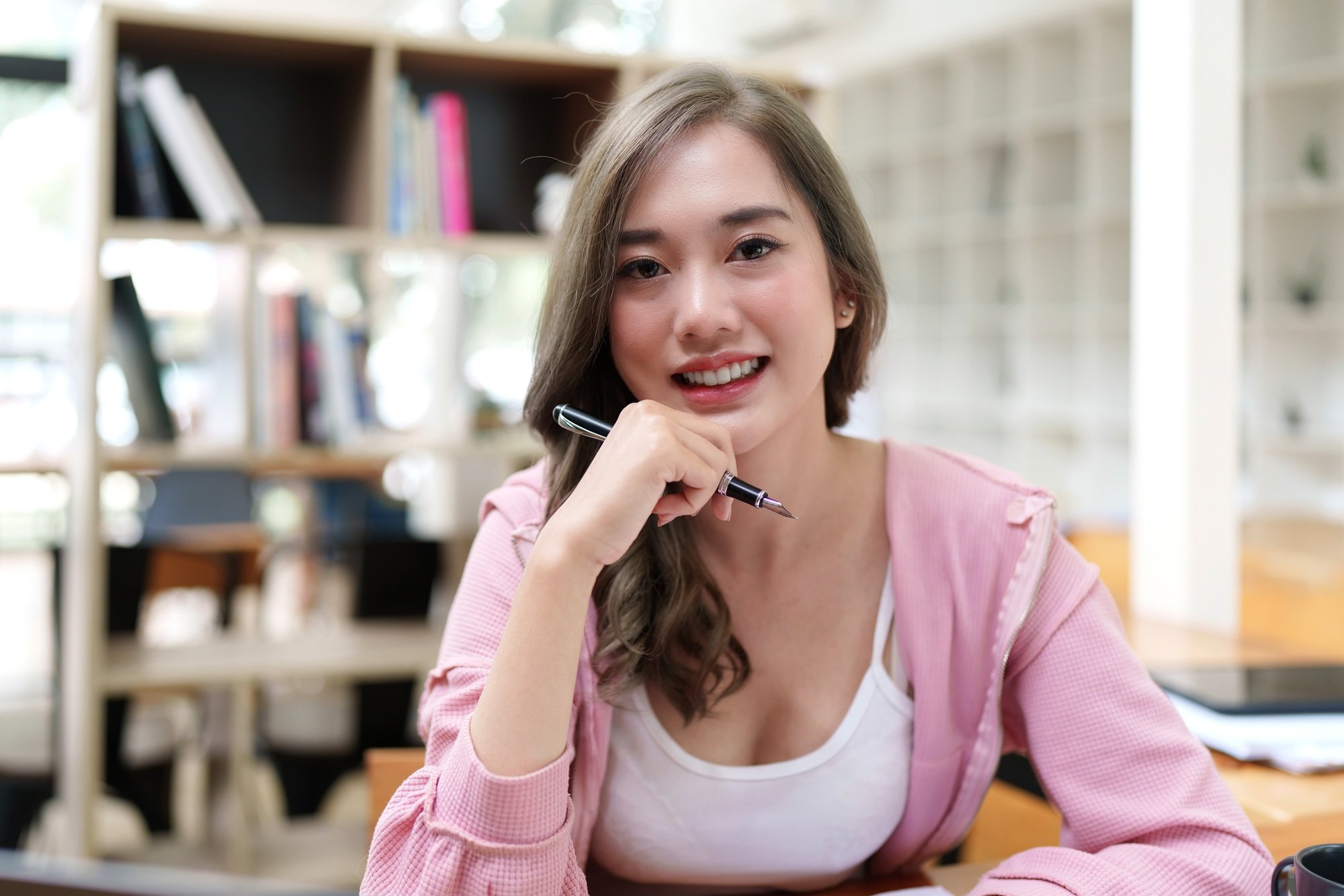 Modern business woman analysis financial paperwork document.