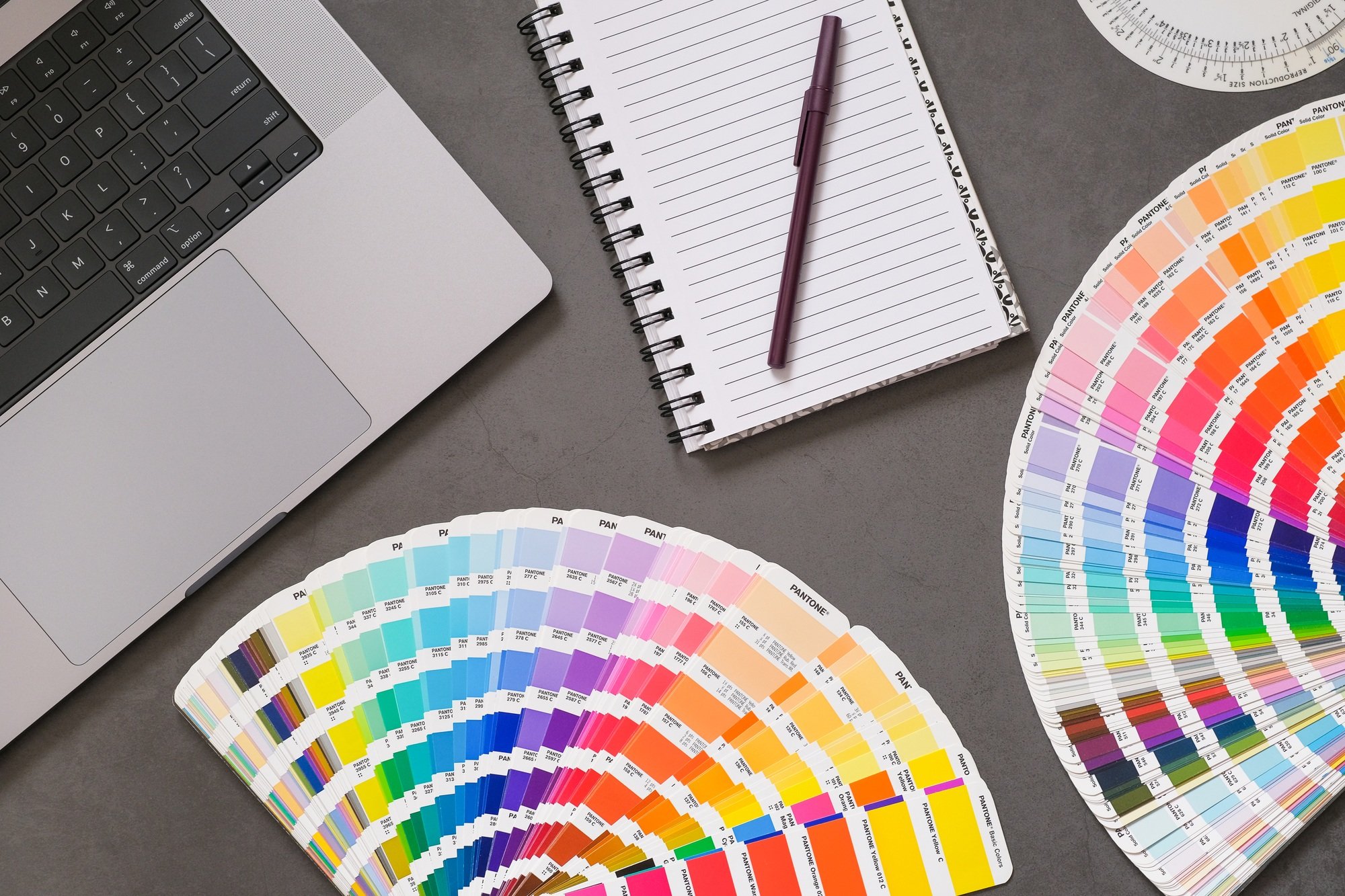 Overhead view of graphic designer's desk
