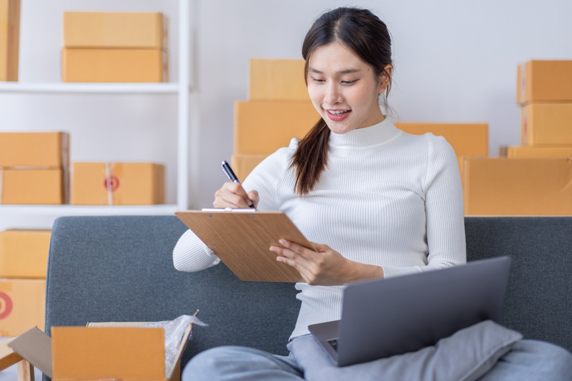 Portrait of Starting small businesses owners female entrepreneurs working on receipt box and check o