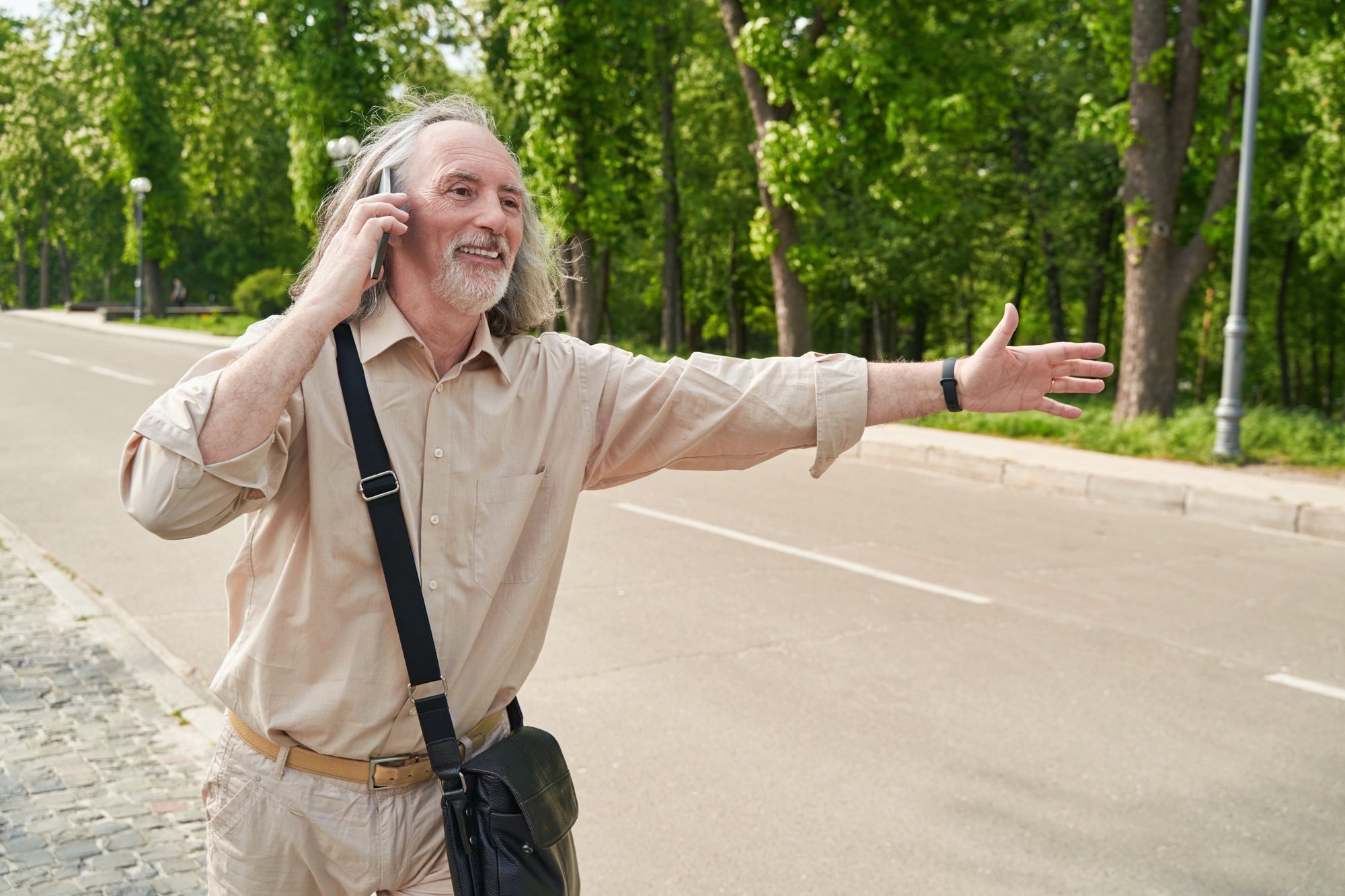 Positive delighted bearded pensioner welcoming his partner