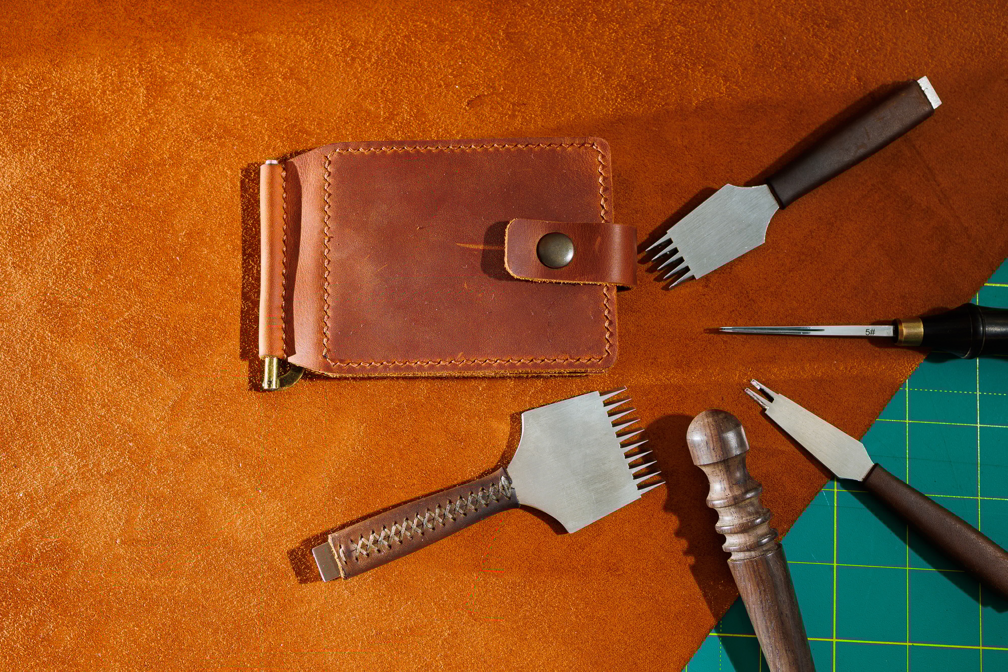 Production of handicrafts from genuine leather. Tools for making leather goods and pieces