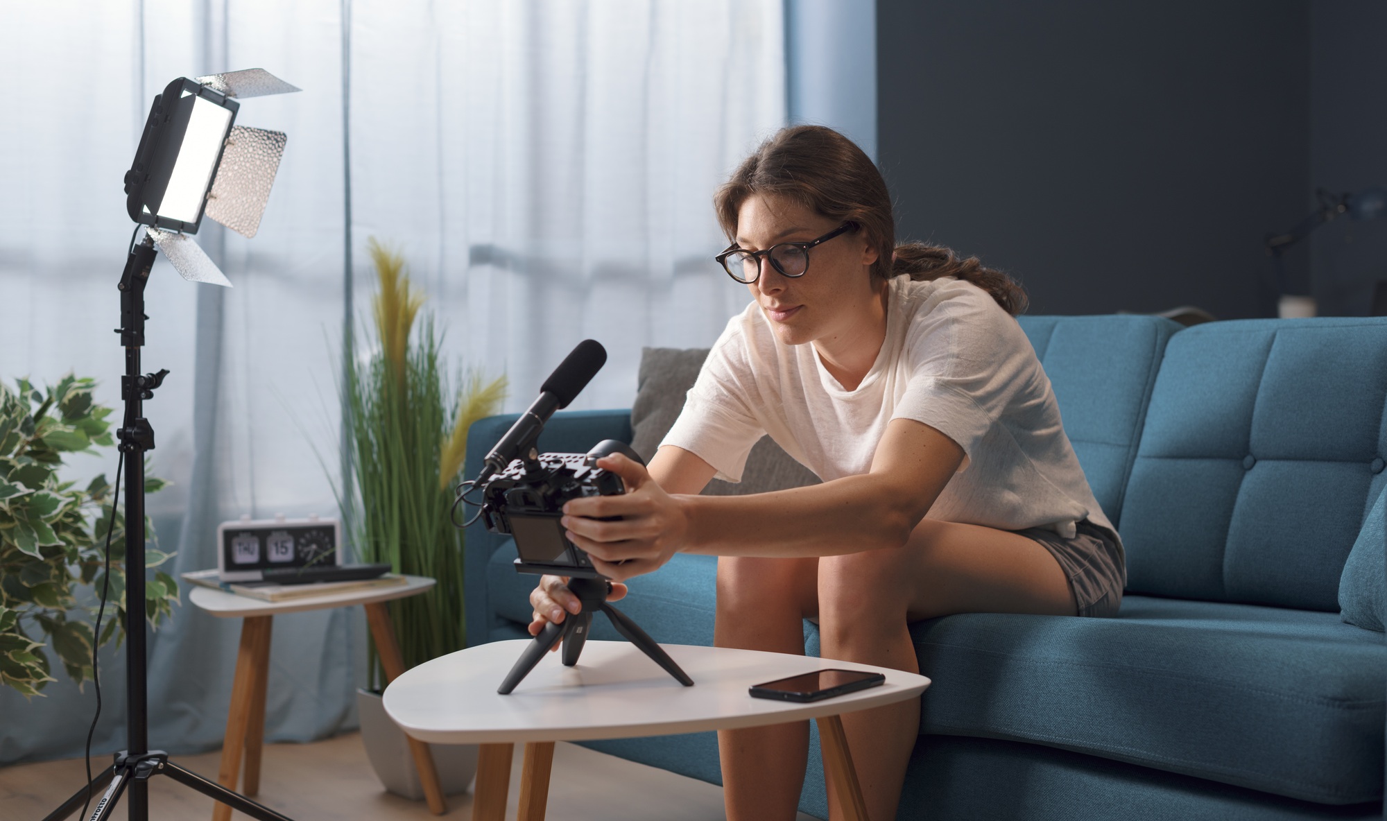 Professional youtuber and vlogger recording a video at home