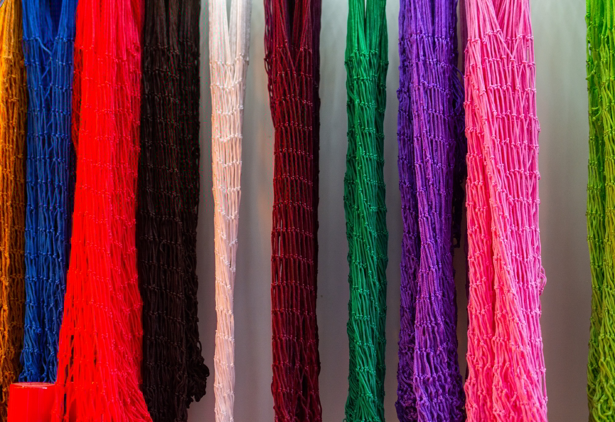 Row of colorful nets displayed on a store