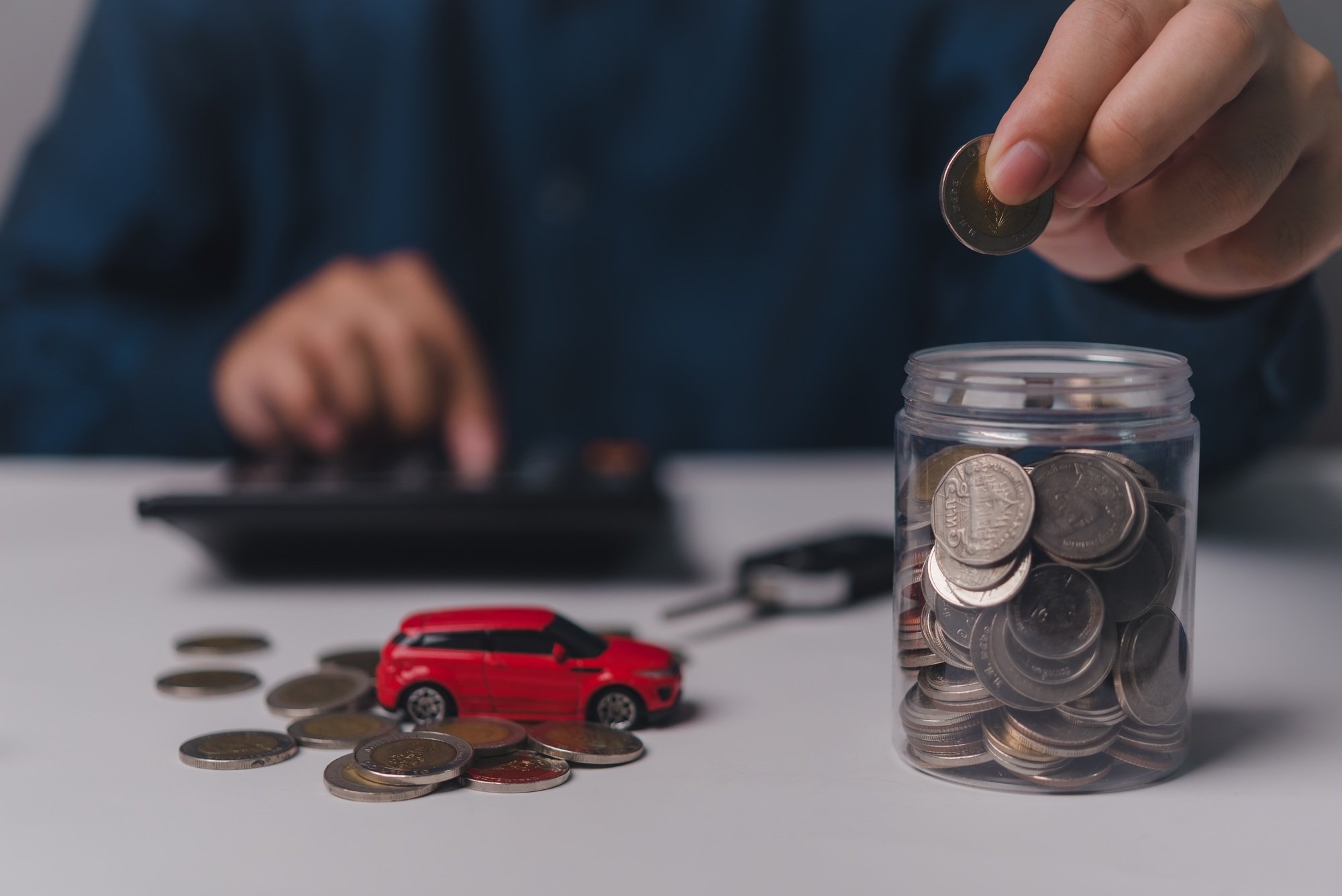 Saving money for a car or car insurance business concepts. Planning Financial statement