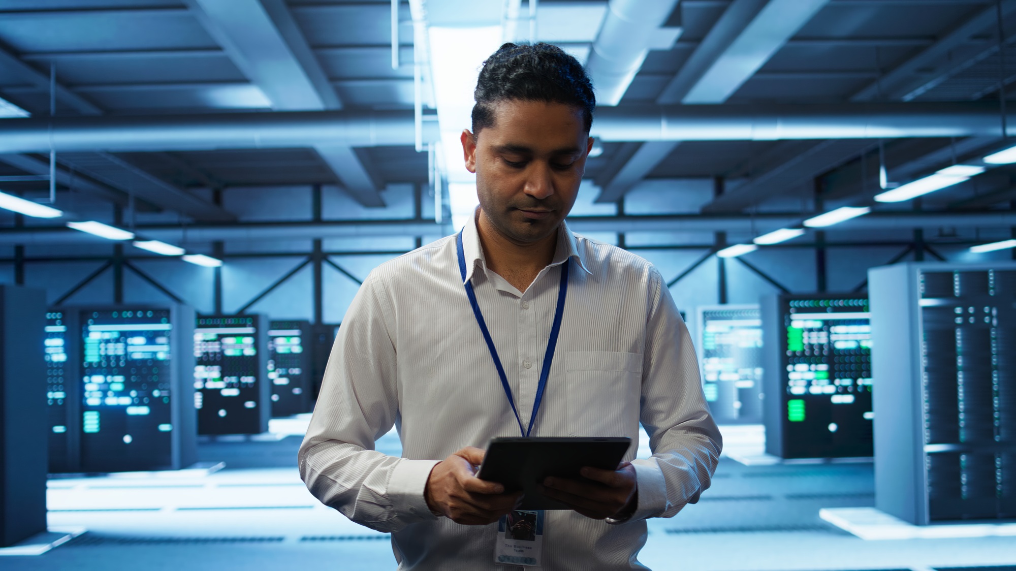 System administrator in data center managing and maintaining databases