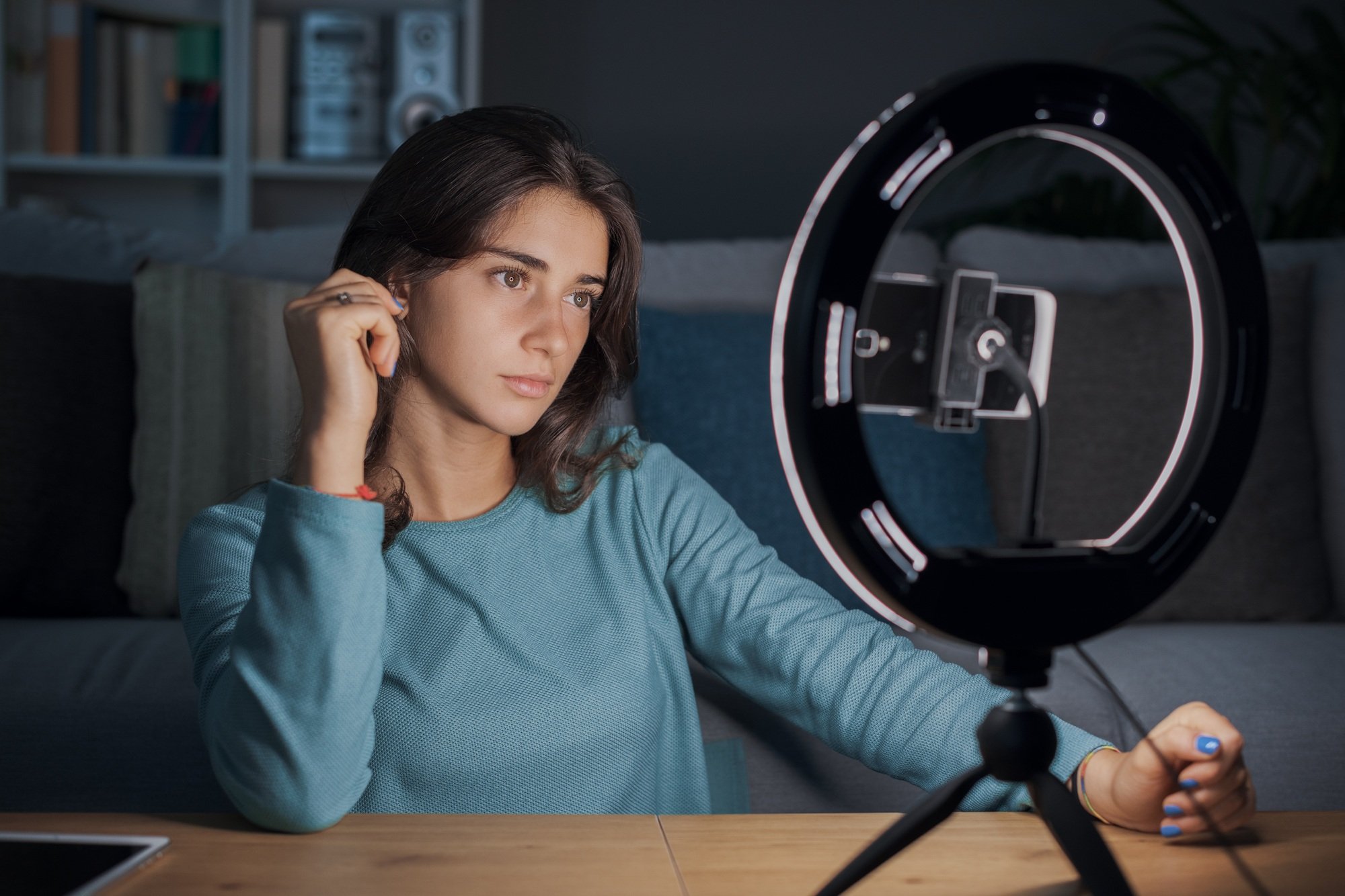 Tiktoker recording videos with her smartphone