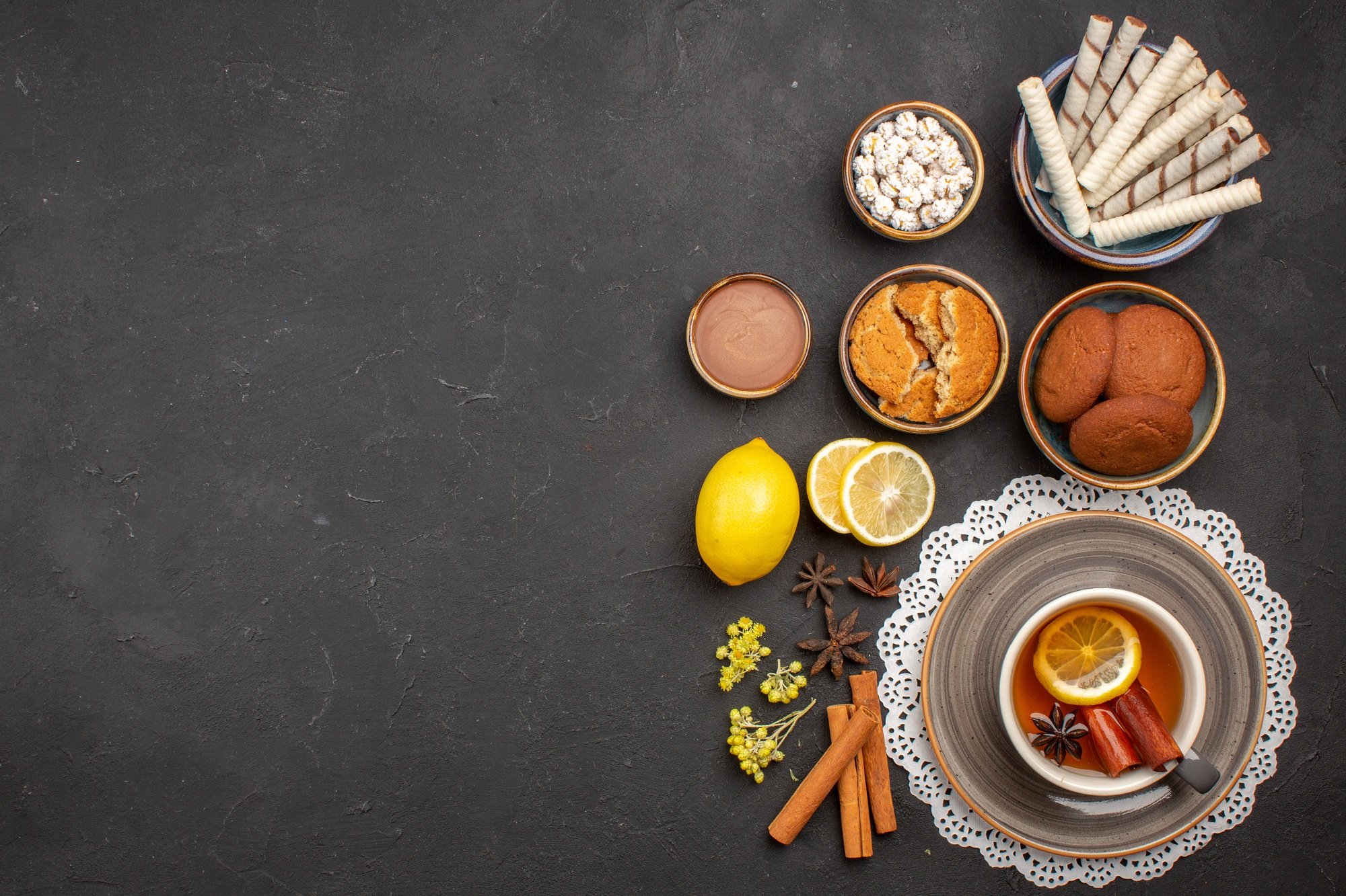 top view delicious cookies with cup of tea on dark background cookie sweet citrus biscuit fruit