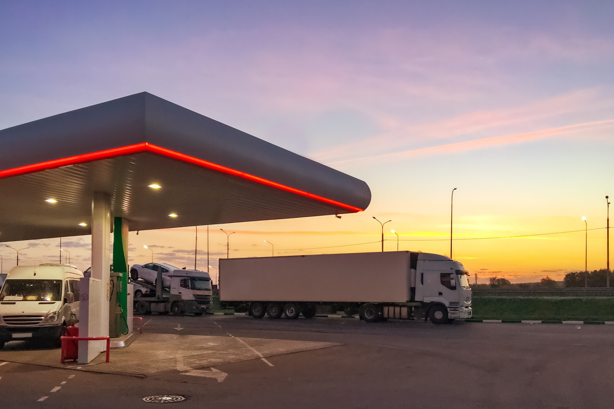 Truck at the parking lot of fueling station.