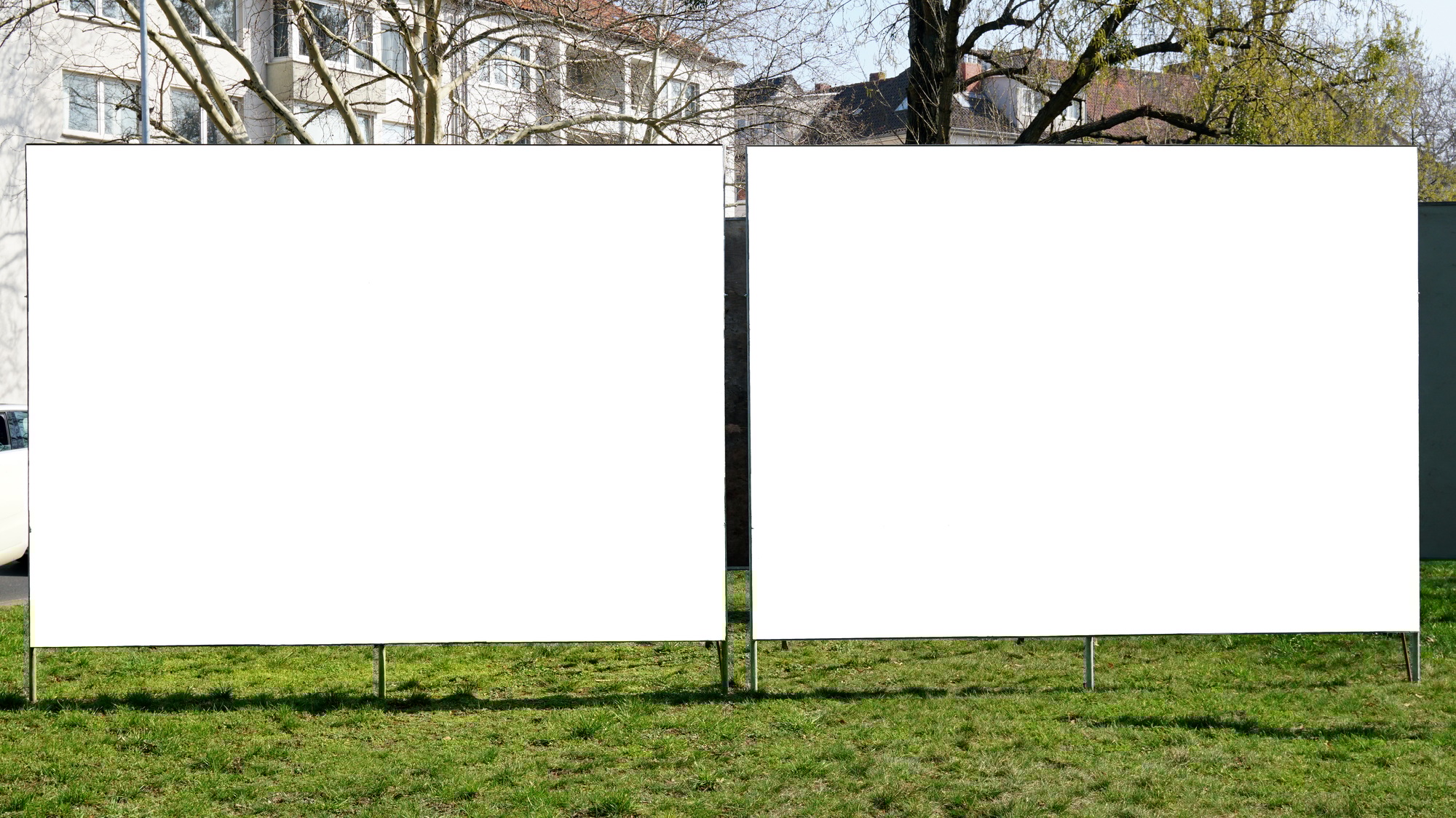 two blank billboards side by side