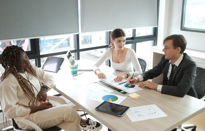Young start-up business team working in meeting room. Start-up office meeting board room