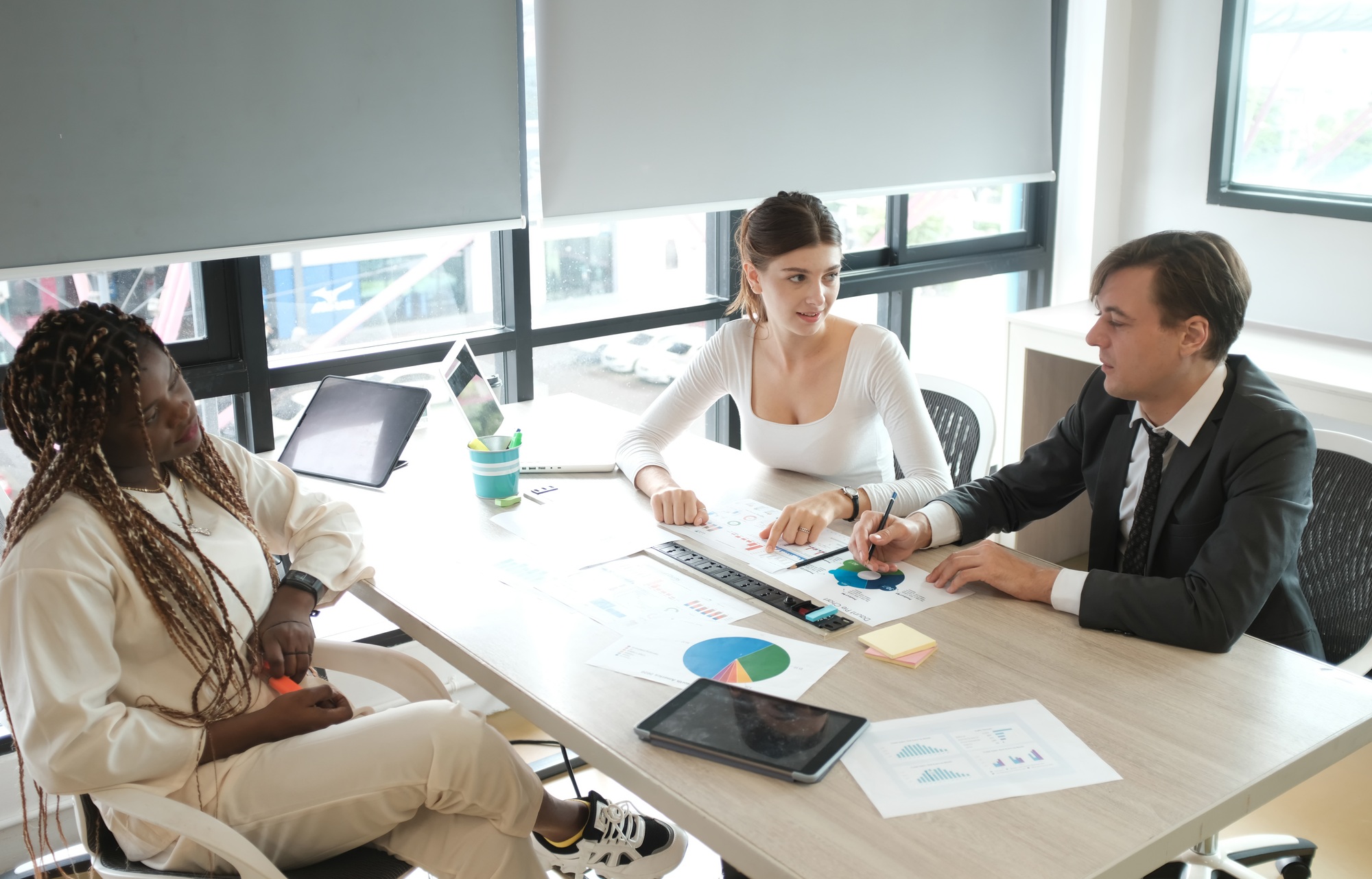 Young start-up business team working in meeting room. Start-up office meeting board room